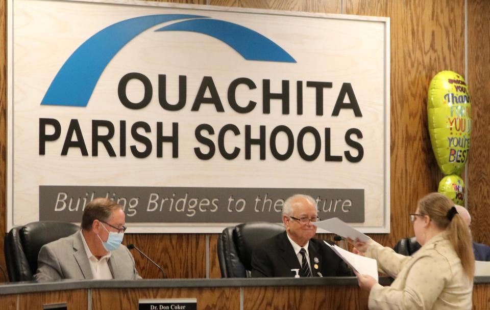 Parent's Choice La. founder Tiffany Hatten presents a letter to the Ouachita Parish School Board at Tuesday's meeting asking the board to overturn COVID emergency policies that have already expired.