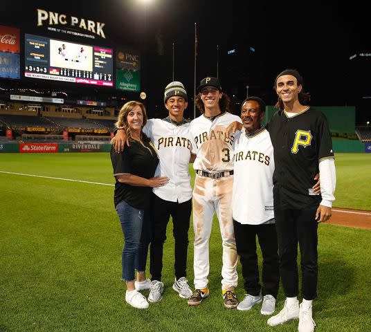 <p>Cole Tucker Instagram</p> Cole Tucker with his parents Erin and Jackie Tucker, and his brothers, Quinn and Carson