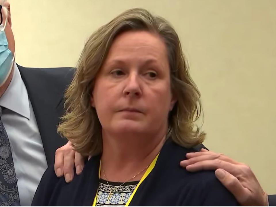 In this screen grab from video, former Brooklyn Center Police Officer Kim Potter stands with defense attorney Earl Gray, as the verdict is read Thursday, Dec.,23, 2021 at the Hennepin County Courthouse in Minneapolis, Minn. Jurors on Thursday convicted Potter of two manslaughter charges in the killing of Daunte Wright, a Black motorist she shot during a traffic stop after she said she confused her gun for her Taser.