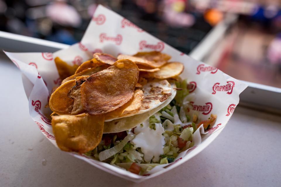 A burger quesadilla is prepared at Southwest University Park in El Paso, TX, on the El Paso Chihuahuas' opening day, Tuesday, April 2, 2024.