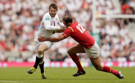 Britain Rugby Union - England v Wales - Old Mutual Wealth Cup - Twickenham Stadium, London, England - 29/5/16 England's Elliot Daly in action with Wales' Jamie Roberts Action Images via Reuters / Henry Browne