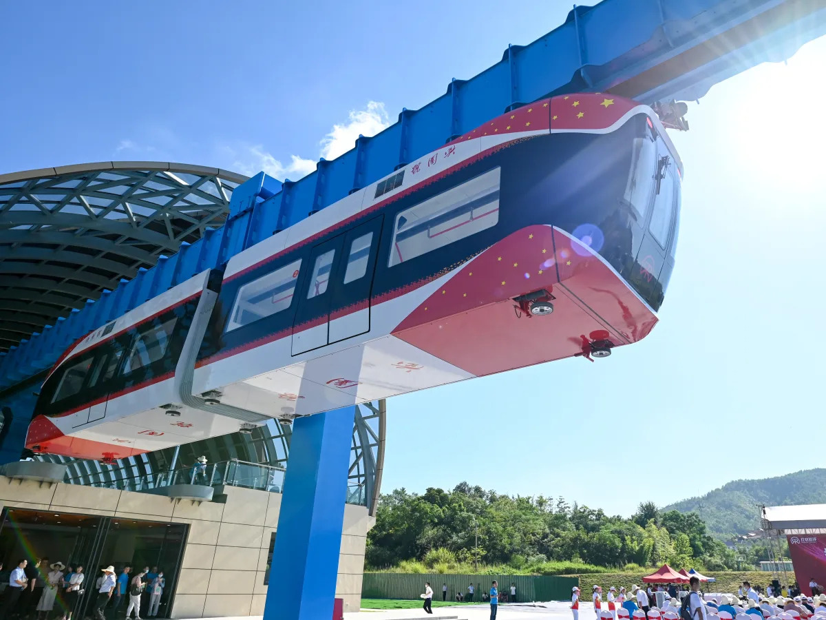China's new 'air train' runs using an overhead magnetic track, never touching it..