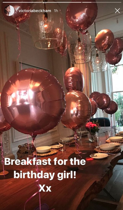 Their dining table covered in pink balloons for Harper's birthday, posted by mum Posh. Source: Instagram