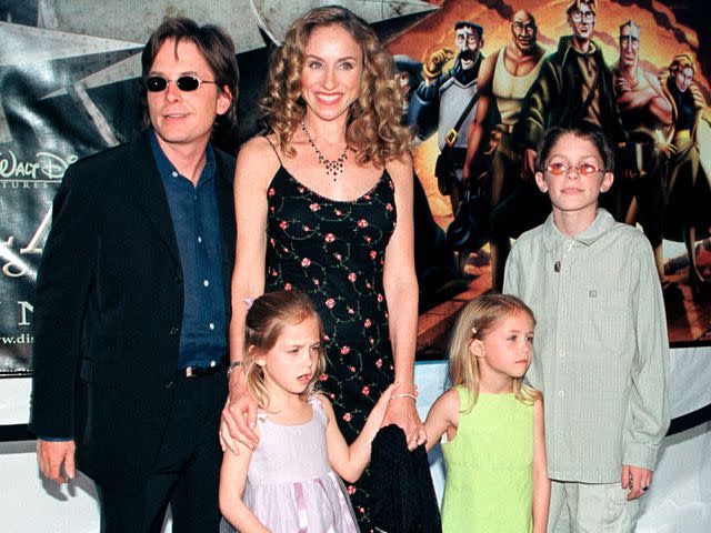 Diane Cohen/Getty Michael J. Fox and wife Tracy Pollan with their kids in 2001