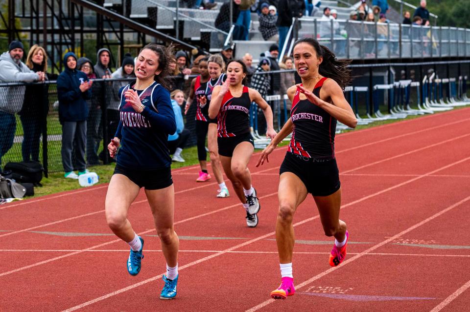 Old Rochester's Maggie Brogioli and Apponequet's Emma Marra battle to the finish line in the 100.
