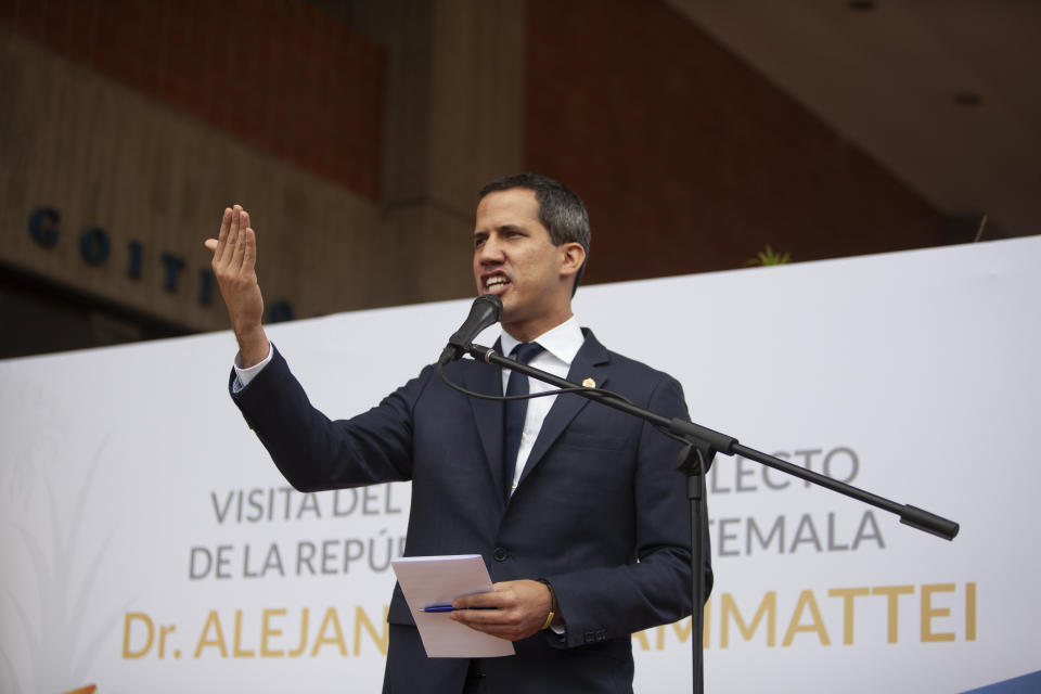 National Assembly President and self-proclaimed interim president of Venezuela Juan Guaido speaks during a press conference after Guatemala's president elect Alejandro Giammattei was denied entry into Venezuela, at the Metropolitan University in Caracas, Venezuela, Saturday, October 12, 2019. Giammattei said he landed early Saturday at the airport near Caracas, but officials denied his entry, escorting him to a departing plane. (AP Photo/Andrea Hernandez Briceño)