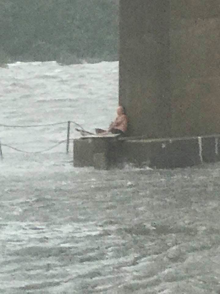 A man was trapped on the pillar under the Theo Baars Bridge in Perdido Key, Florida, after the boat he tried to ride out Hurricane Sally on broke loose in a marina and capsized.