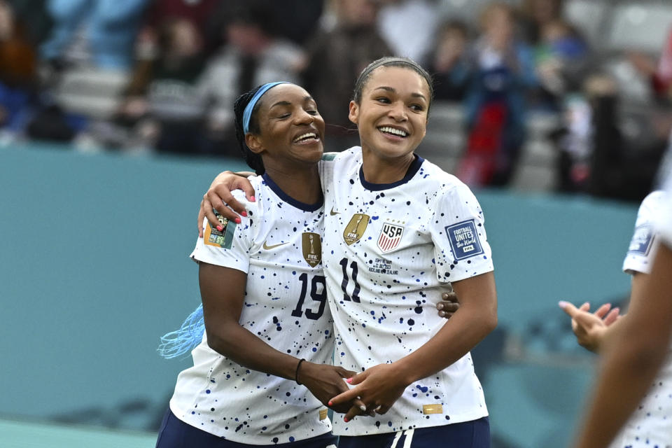 United States' Sophia Smith, right, celebrates with United States' Crystal Dunn after scoring her side's 2nd goal during the Women's World Cup Group E soccer match between the United States and Vietnam at Eden Park in Auckland, New Zealand, Saturday, July 22, 2023. (AP Photo/Andrew Cornaga)