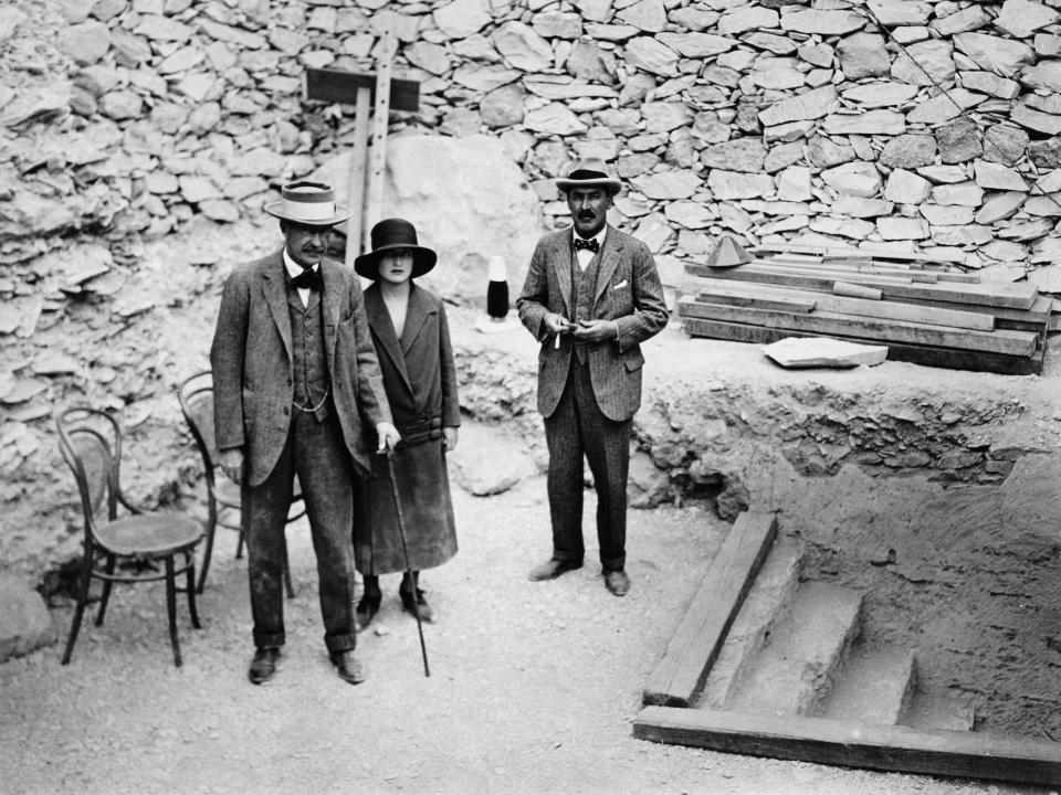 Lord Carnarvon, Lady Evelyn Herbert, and Howard Carter at the entrance to the tomb of Tutankhamun.