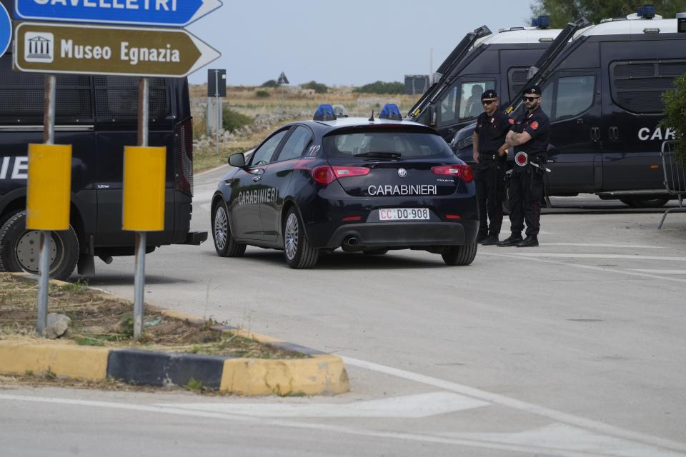 Italian Carabinieri, paramilitary policemen, patrol at a roadblock near Borgo Egnatia, venue of the G7 summit in southern Italy, Wednesday, June 12, 2024. A Group of Seven summit aiming to consolidate support for Ukraine opens Thursday under a vastly different political landscape than even a few days ago, after European Parliament elections jolted the leaders of France and Germany and emboldened Italian Premier Giorgia Meloni. (AP Photo/Gregorio Borgia)