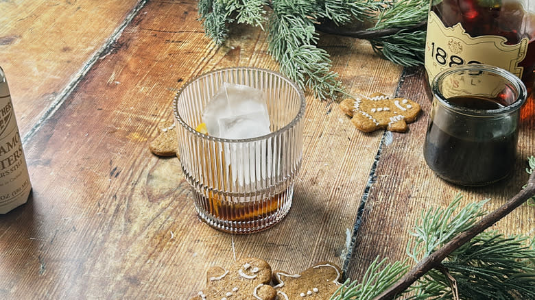 ice in glass with orange and bitters