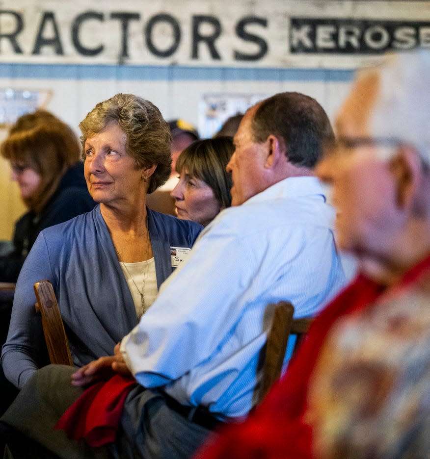 Members of the Westside Conservative Club listen to candidates in the Republican primary for Iowa's 3rd Congressional District Wednesday, April 27, 2022, at the Machine Shed in Urbandale, Iowa.