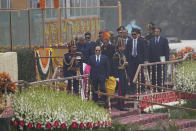Egyptian President Abdel Fattah El-Sissi, centre, leaves after witnessing India's Republic Day celebrations at the ceremonial Kartavya Path boulevard during in New Delhi, India, Thursday, Jan. 26, 2023. El-Sissi, was the official guest of India’s Republic Day event, which marked the anniversary of the adoption of the country’s constitution on Jan. 26, 1950, nearly three years after it won independence from British colonial rule. (AP Photo/Manish Swarup)
