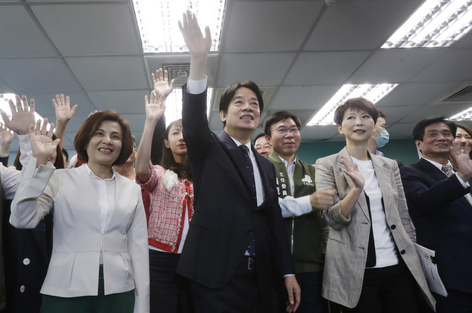 Taiwan's Vice President Lai Ching-te, also known as William Lai, center, cheers during a press conference in Taipei, Taiwan, Wednesday, April 12, 2023. Taiwan’s pro-independence ruling Democratic Progressive Party nominated Lai as its candidate in the 2024 presidential election, two days after China concluded large-scale wargames around the self-governed island. (AP Photo/Chiang Ying-ying)