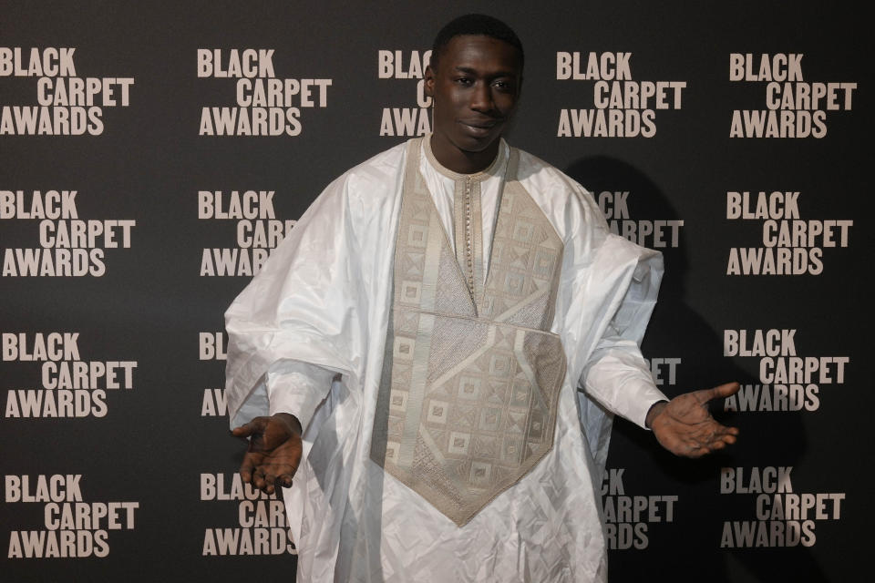 Khaby Lame attends the first edition of the 'Black carpet awards', in Milan, Italy, Friday, Feb. 24, 2023. The founder of the Afro Fashion Association in Italy on Thursday said she is launching awards recognizing the achievements of minorities in Italian society, to promote greater diversity and inclusion. (AP Photo/Luca Bruno)