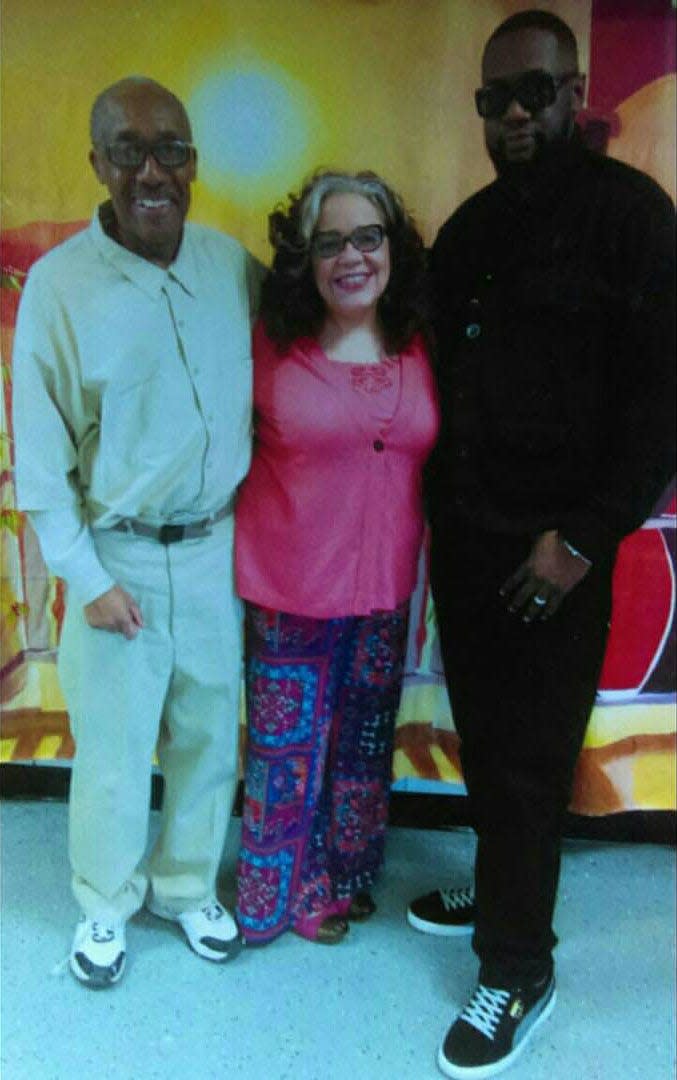 Wayne Pray, left, with wife Millie Harris, and Jeff Billingsley, inside Otisville prison.