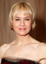 In the years since high school, Renee Zellweger seems to have kept her chic bangs, but ditched the toothy smile for her familiar pout. (Credit: Todd Williamson/WireImage)