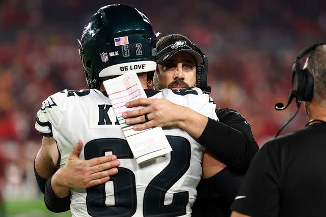 <p>Kevin Sabitus/Getty Images</p> Jason Kelce #62 of the Philadelphia Eagles hugs head coach Nick Sirianni during the fourth quarter of an NFL wild-card playoff football game against the Tampa Bay Buccaneers at Raymond James Stadium on January 15, 2024 in Tampa, Florida.