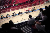 Athletes compete during the track cycling men's omnium tempo race at the 2020 Summer Olympics, Thursday, Aug. 5, 2021, in Izu, Japan. (AP Photo/Christophe Ena)