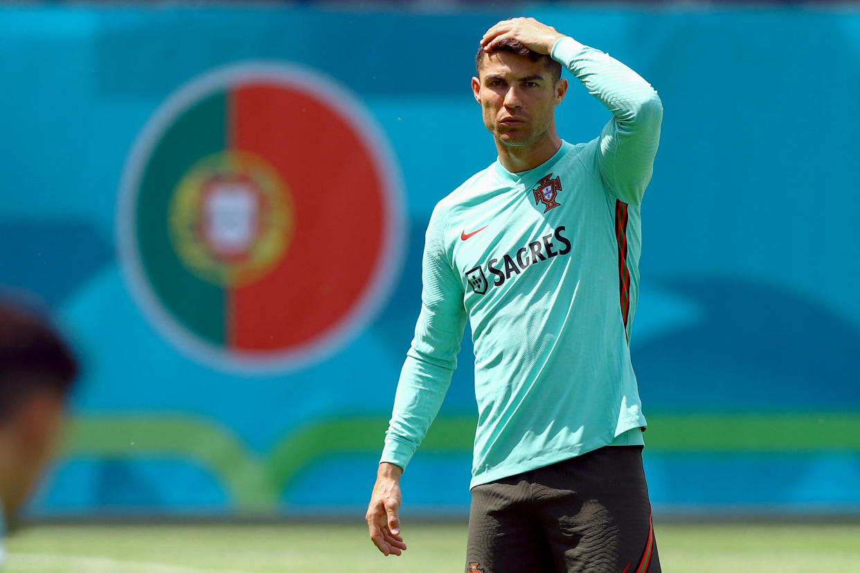 Portugal's forward Cristiano Ronaldo gestures during a training session at the Illovszky Rudolf stadium in Budapest on June 11, 2021, ahead of their UEFA EURO 2020 football match against Hungary. (Photo by FERENC ISZA / AFP) (Photo by FERENC ISZA/AFP via Getty Images)