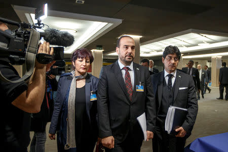 Syria's main opposition High Negotiations Committee (HNC) leader Nasr al-Hariri, center, arrives to take part in a round of negotiation with UN Special Envoy of the Secretary-General for Syria Staffan de Mistura (not pictured), during the Intra Syria talks, at the European headquarters of the United Nations in Geneva, Switzerland, Friday, March 3, 2017. REUTERS/Salvatore Di Nolfi/Pool