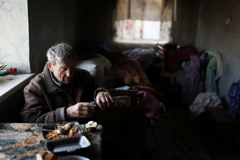 The Wider Image: Elderly brothers eke out life among ruins of Ukraine war