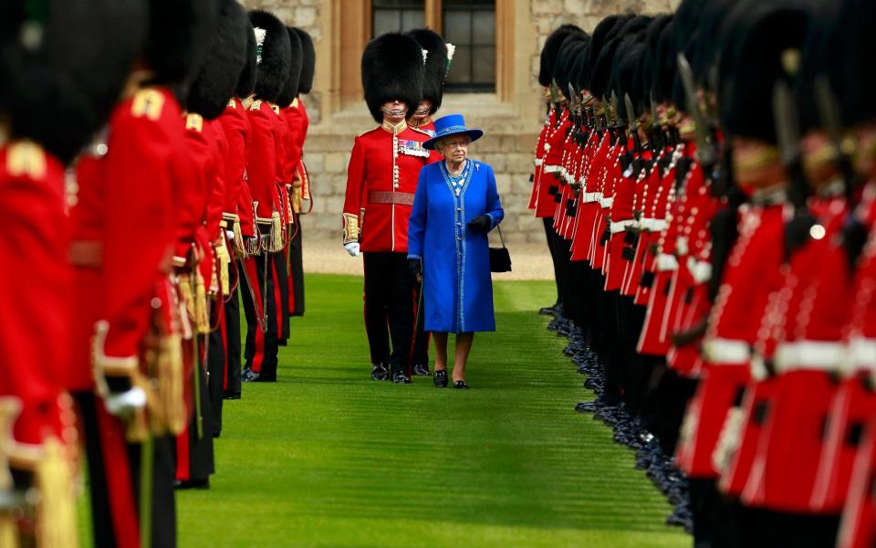 The Queen pictured with the 1st Battalion Welsh Guards at Windsor Castle - Credit: Cathal McNaughton /PA