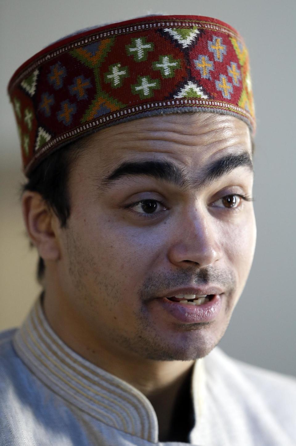 India's Shiva Keshavan speaks at a luncheon at the 2014 Winter Olympics, Tuesday, Feb. 11, 2014, in Sochi, Russia. Keshavan competed in the men's singles luge under the Olympic flag because India's Olympic body had been suspended by the IOC in 2012 over a corruption scandal. The IOC executive board reinstated the Indian Olympic body on Tuesday, Feb. 11, 2014, after it held a weekend ballot that complied with ethics rules barring corruption-tainted officials from running for election. (AP Photo/Morry Gash)