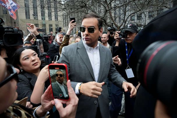 PHOTO: Rep. George Santos walks through the crowd gathered outside the courthouse where former President Donald Trump will arrive later in the day for his arraignment on April 4, 2023, in New York City. (Drew Angerer/Getty Images)