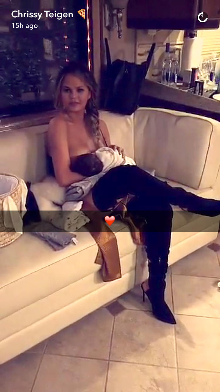 Chrissy Teigen getting the job done for Luna. <i>(Photo: Snapchat)</i>