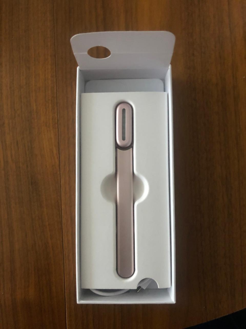 The Solawave wand in its box.