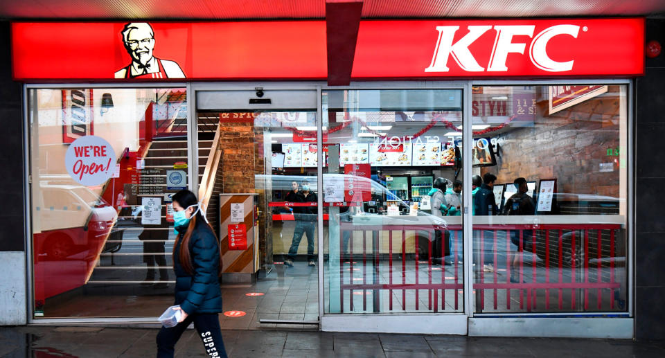Photo shows the front of a KFC store.