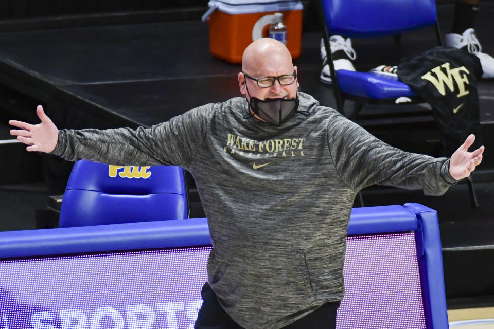 Wake Forest head coach Steve Forbes gestures to his team during the first half of an NCAA college basketball game, Tuesday, March 2, 2021, in Pittsburgh. (AP Photo/Fred Vuich)