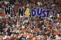 Fans hold up a sign for Houston Astros manager Dusty Baker Jr. during the first inning in Game 6 of baseball's World Series between the Houston Astros and the Philadelphia Phillies on Saturday, Nov. 5, 2022, in Houston. (AP Photo/David J. Phillip)