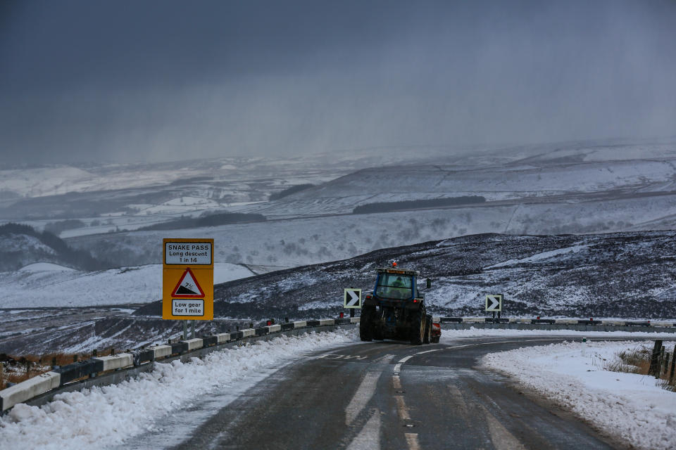 Snake’s Pass in the Peak District appears particularly treacherous, covered in snow with icy road conditions (SWNS)