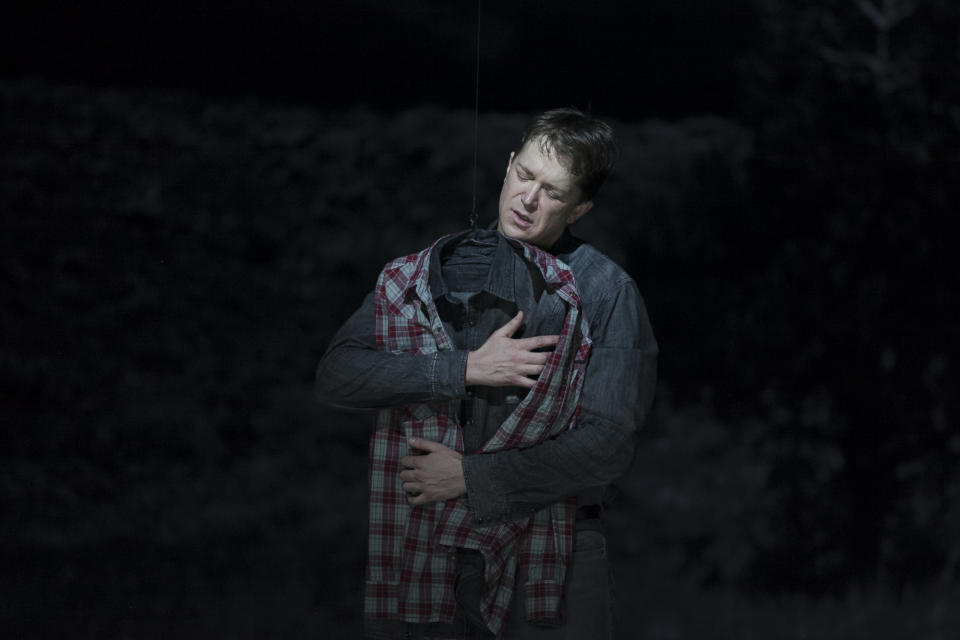 In this photo taken on Friday, Jan. 24, 2014 Canadian bass-baritone Daniel Okulitch (Ennis del Mar), performs during the press rehearsal of the production "Brokeback Mountain" at the Teatro Real, in Madrid, Spain. It was a short story, then a Hollywood movie. Now the tragic tale of cowboys in love is being reinvented again: Brokeback Mountain _ the opera. Ahead of its world premiere in Madrid, author Annie Proulx told The Associated Press that the form of opera presented an opportunity to explore the complexities of the tale in a way neither her own short story nor the movie by director Ang Lee were able to do. (AP Photo/Gabriel Pecot)