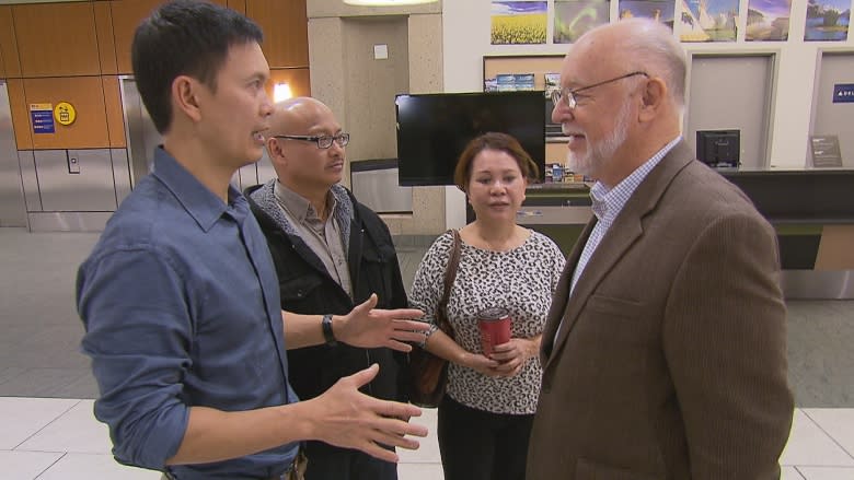 He smuggled two young boys out of Laos in 1977, now they've reunited