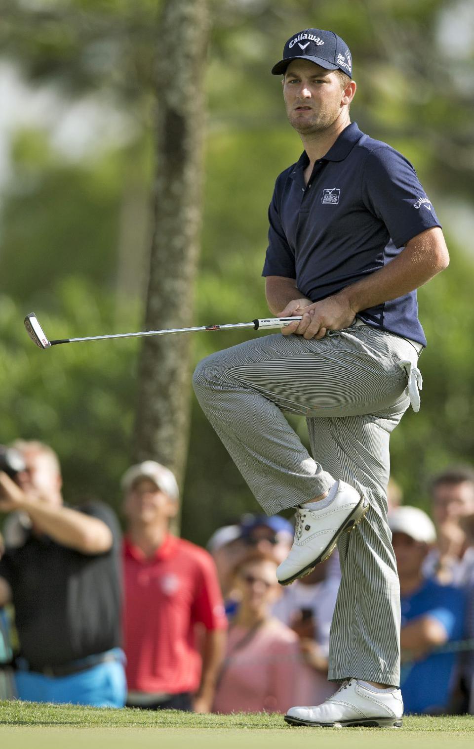 Matt Every kicks up his leg as he misses a putt on the 14th hole during the final round of the Arnold Palmer Invitational golf tournament at Bay Hill, Sunday, March 23, 2014, in Orlando, Fla. Every went onto win the tournament. (AP Photo/Willie J. Allen Jr.)