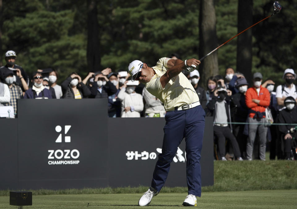 Hideki Matsuyama of Japan hits his tee shot on the ninth hole during the final round of the Zozo Championship golf tournament at Accordia Golf Narashino Country Club on Sunday, Oct. 24, 2021, in Inzai, Chiba Prefecture, Japan. (AP Photo/Tomohiro Ohsumi)