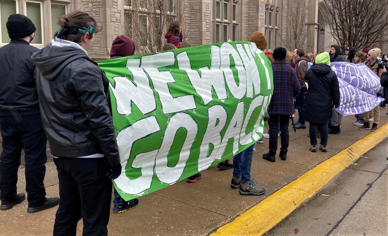 Members of Mizzou Coalition for Bodily Autonomy protest outside Memorial Union while a University of Missouri System Board of Curators Meeting commences inside the building on Feb. 10, 2023, in Columbia, Mo. The students are seeking the university to provide free Plan B emergency contraceptives.