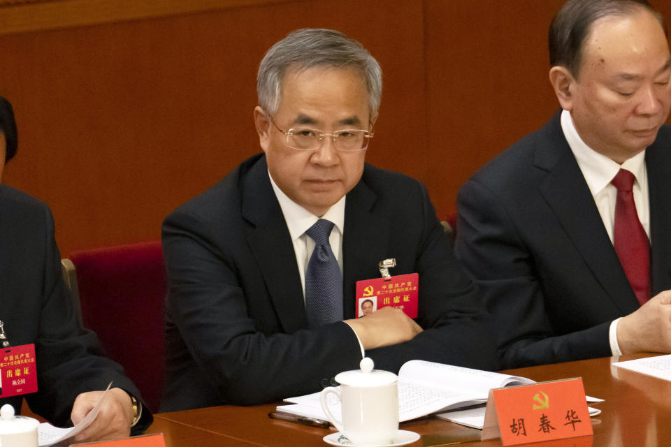 Vice Premier Hu Chunhua attends the opening ceremony of the 20th National Congress of China's ruling Communist Party at the Great Hall of the People in Beijing, China, Sunday, Oct. 16, 2022. While Xi Jinping is primed to receive a third five-year term as head of China's ruling Communist Party at this week's congress, new members of the party's leading bodies are expected to be appointed at the meeting, whose proceedings are mainly held behind closed doors. (AP Photo/Mark Schiefelbein)