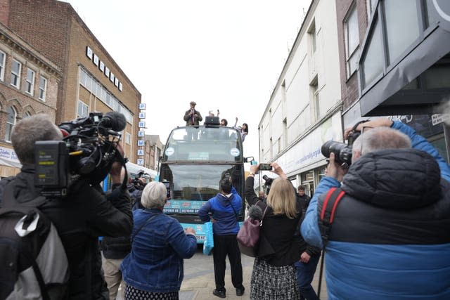 Reform UK leader Nigel Farage makes a speech on the Reform UK campaign bus in Barnsley, South Yorkshire, whilst on the General Election campaign trail on June 11