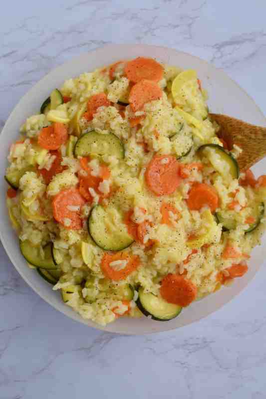 <p>The Incredible Bulks</p><p>Summer squash rice pilaf is a tasty and easy side dish. Tender carrots, zucchini, and yellow squash are mixed with creamy rice. The best part is that it pairs well with pretty much anything!</p><p><strong>Get the recipe: <a href="https://www.theincrediblebulks.com/summer-squash-rice-pilaf/" rel="nofollow noopener" target="_blank" data-ylk="slk:Summer Squash Rice Pilaf;elm:context_link;itc:0;sec:content-canvas" class="link ">Summer Squash Rice Pilaf</a></strong></p>