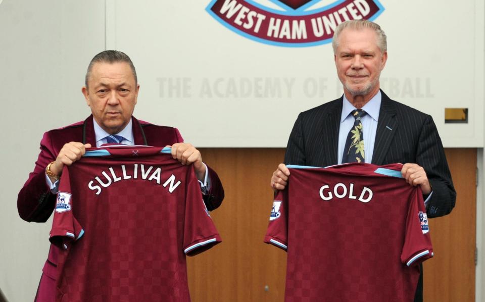 David Gold and David Sullivan holding their West Ham jerseys - Anthony Devlin/PA