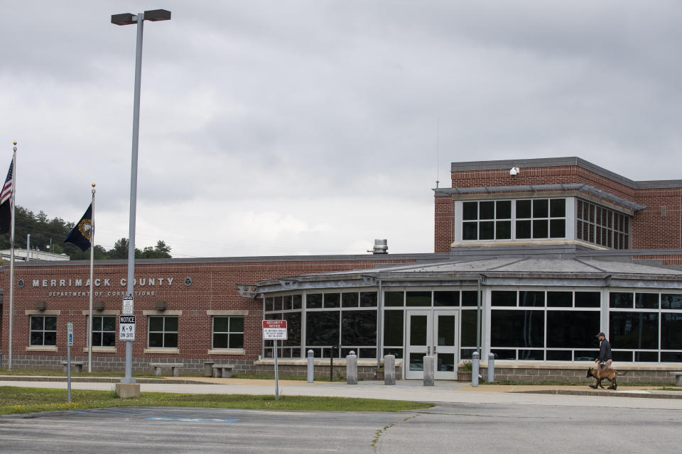 A police K-9 walks outside the Merrimack County correctional facility, Friday, July 3, 2020 , in Boscowen N.H., where Ghislaine Maxwell was being held after her arrest Thursday at a wooded estate in Bradford, N.H. The British socialite faces charges she helped lure at least three girls — one as young as 14 — to be sexually abused by the late financier Jeffrey Epstein. (AP Photo/Winslow Townson)