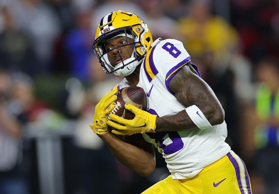 TUSCALOOSA, ALABAMA - NOVEMBER 04:  Malik Nabers #8 of the LSU Tigers pulls in this touchdown reception against the Alabama Crimson Tide during the first quarter at Bryant-Denny Stadium on November 04, 2023 in Tuscaloosa, Alabama.  (Photo by Kevin C. Cox/Getty Images)