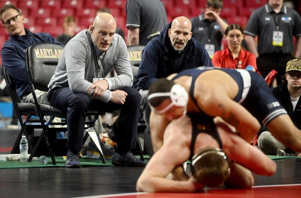 Penn State wrestling coach Cael Sanderson yells to Aaron Brooks during his 197 lb championship bout of the Big Ten Wrestling tournament at the Xfinity Center at the University of Maryland on Sunday, March 10, 2024.