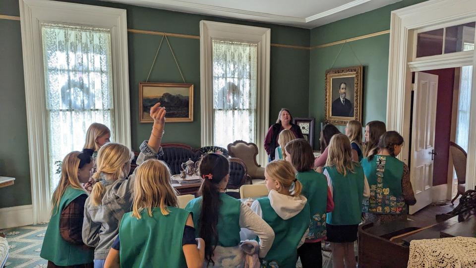 A school group experiences West Des Moines' history at the Jordan House and Bennett School.