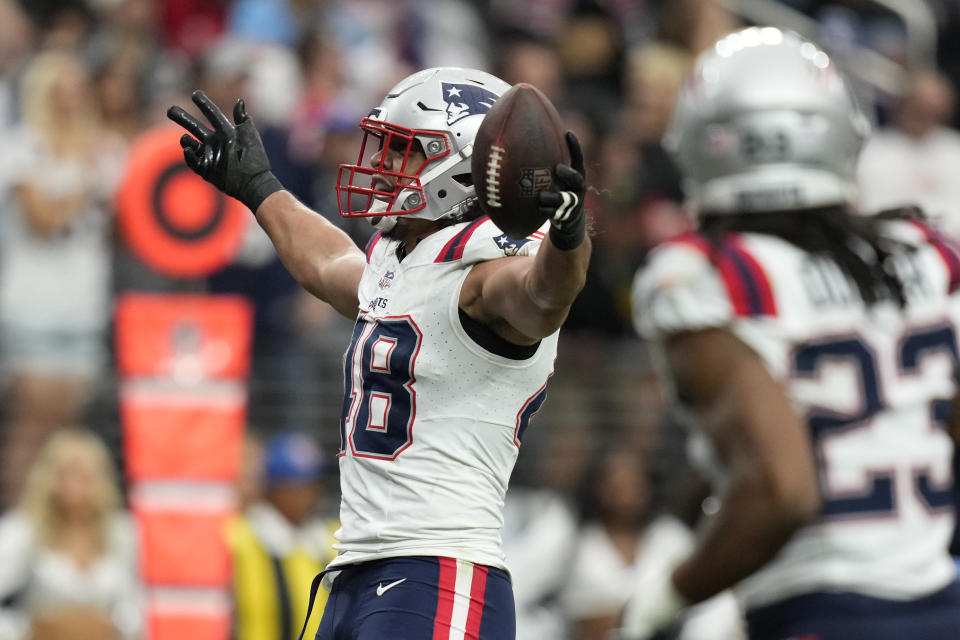 New England Patriots linebacker Jahlani Tavai celebrates his interception during the first half of an NFL football game against the Las Vegas Raiders, Sunday, Oct. 15, 2023, in Las Vegas. (AP Photo/John Locher)