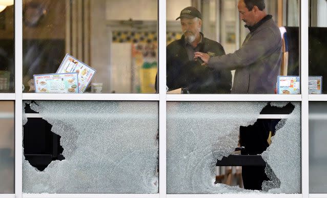 Shattered glass at the Waffle House restaurant near Tennessee. Source: AAP